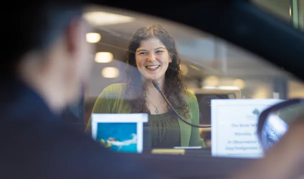 Essex Bank employee at ATM bank teller drive through