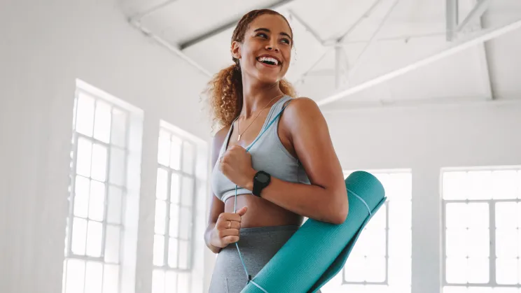 Woman leaving yoga class